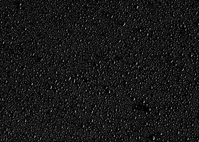 Water droplets on black background